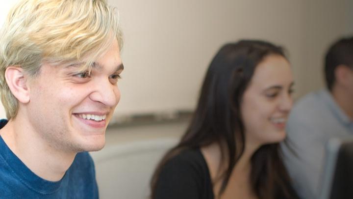 Computer science students sitting in a classroom